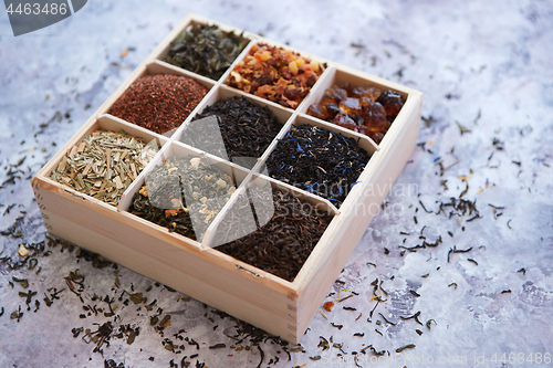 Image of Various kind of dry tea in wooden box