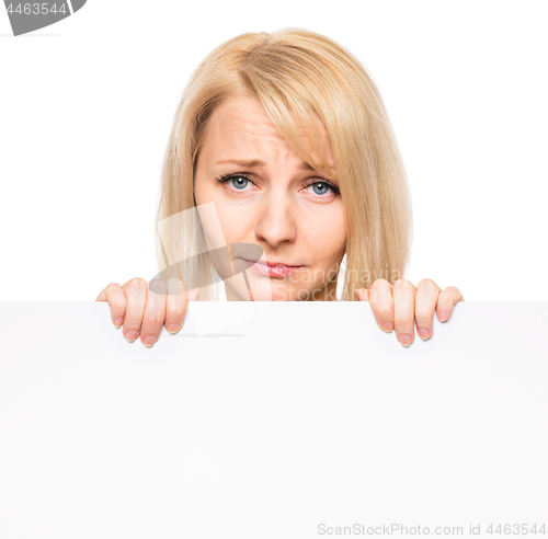 Image of Woman with blank signboard