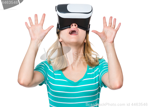 Image of Woman looking in VR glasses