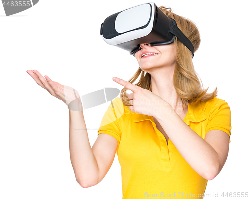 Image of Woman looking in VR glasses