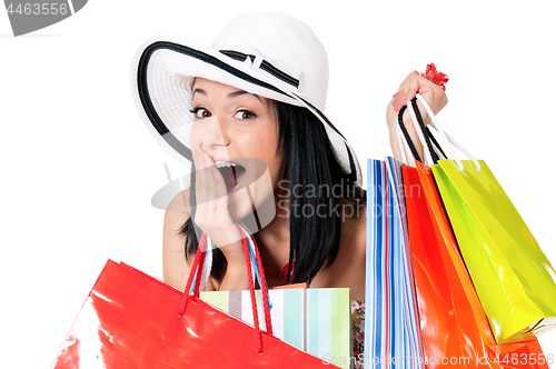 Image of Young shopaholic woman