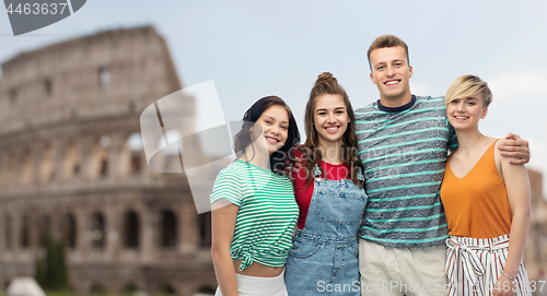 Image of happy friends hugging over coliseum background