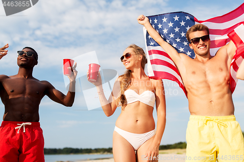 Image of friends at american independence day beach party