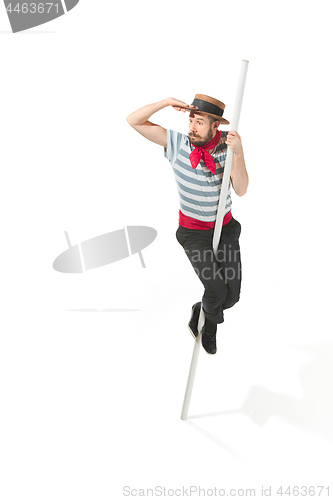 Image of Caucasian man in traditional gondolier costume and hat