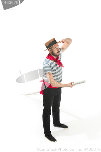 Image of Caucasian man in traditional gondolier costume and hat