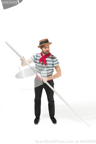 Image of Caucasian man in traditional gondolier costume and hat