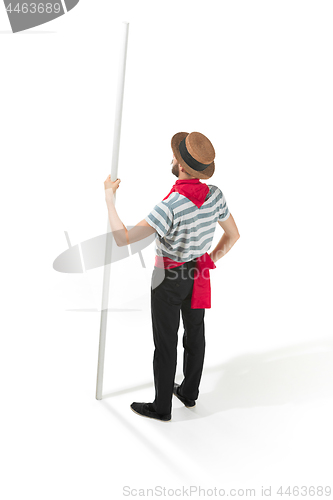 Image of Caucasian man in traditional gondolier costume and hat