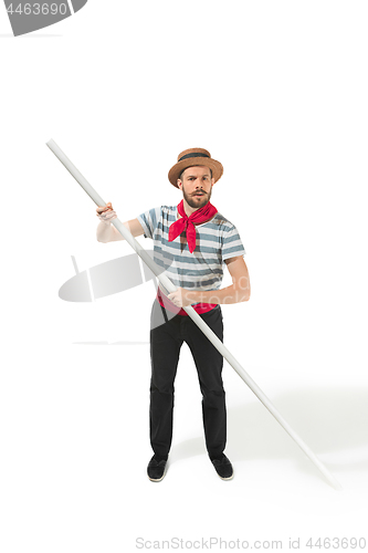 Image of Caucasian man in traditional gondolier costume and hat