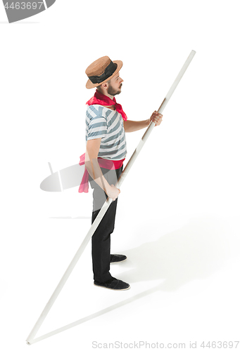 Image of Caucasian man in traditional gondolier costume and hat