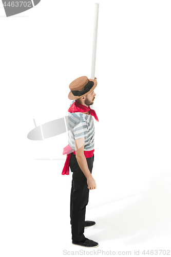 Image of Caucasian man in traditional gondolier costume and hat