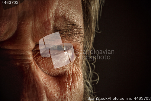 Image of Close-up view on the eye of senior man.