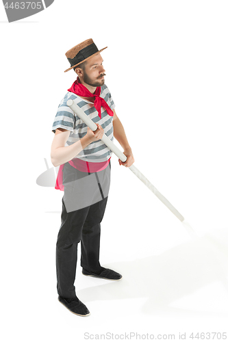 Image of Caucasian man in traditional gondolier costume and hat