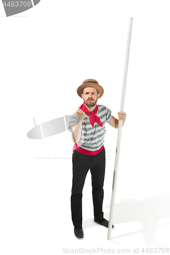 Image of Caucasian man in traditional gondolier costume and hat