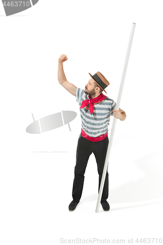 Image of Caucasian man in traditional gondolier costume and hat