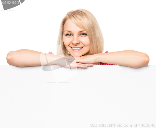 Image of Woman with blank signboard