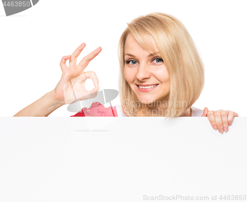 Image of Woman with blank signboard