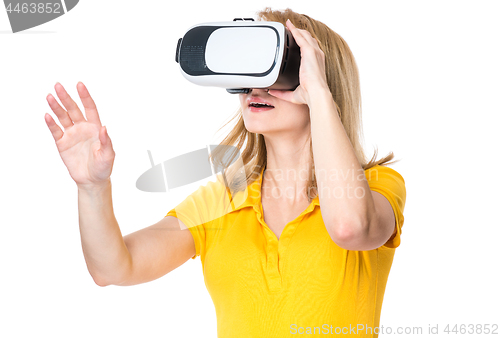 Image of Woman looking in VR glasses