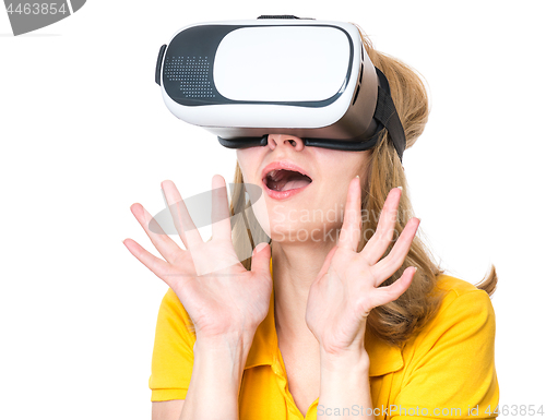 Image of Woman looking in VR glasses