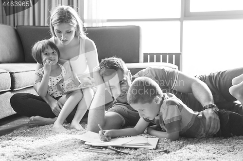 Image of young couple spending time with kids