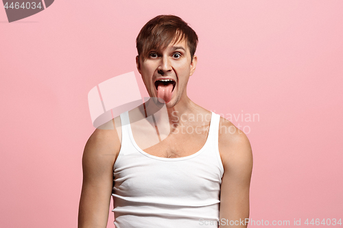 Image of Handsome man in stress isolated on pink