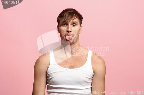 Image of Handsome man in stress isolated on pink