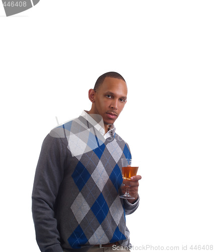 Image of Young black man in sweater with wine glass