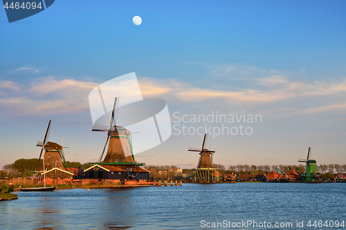 Image of Windmills at Zaanse Schans in Holland in twilight on sunset. Zaa