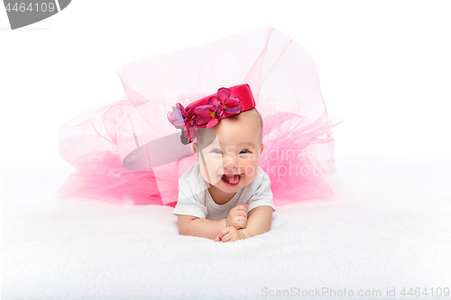 Image of happy beautiful baby girl with pink hat on head