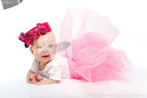 Image of happy beautiful baby girl with pink hat on head