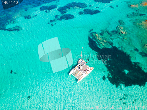 Image of Drone aerial view of catamaran sailing boat in Maddalena Archipelago, Sardinia, Italy.