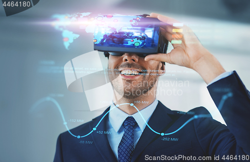 Image of businessman with virtual reality headset at office