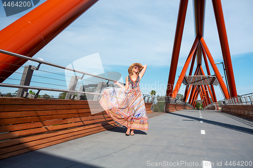 Image of Woman walking across Yandhai Nepean Crossing