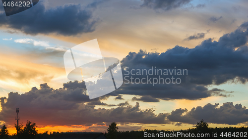 Image of Colorful Sunset Sky With Dark Cumulus Clouds