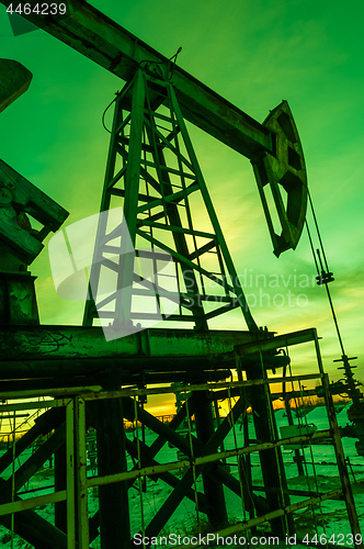 Image of Oil pump jack. Extraction of oil. Petroleum concept.