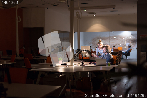 Image of young designers in the night office