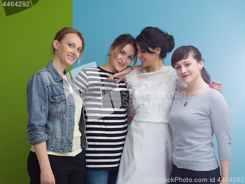 Image of Bride with bridesmaids on the wedding day