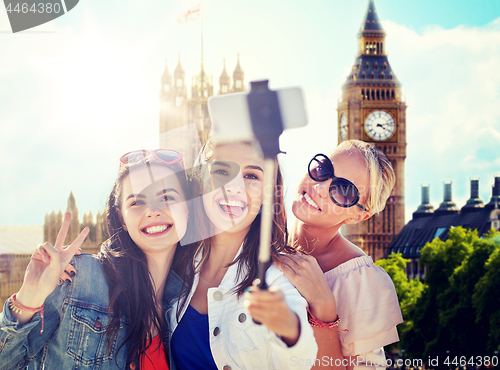 Image of group of smiling women taking selfie in london