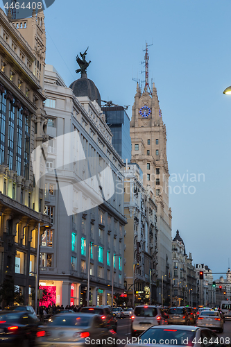 Image of Madrid, Spain. Gran Via, main shopping street at dusk.