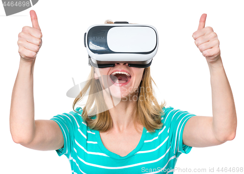 Image of Woman looking in VR glasses