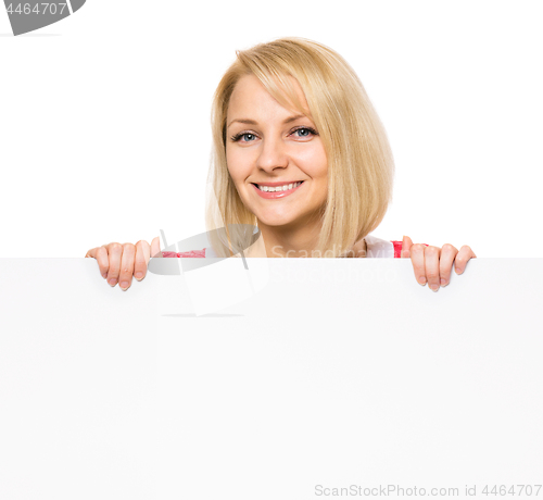 Image of Woman with blank signboard