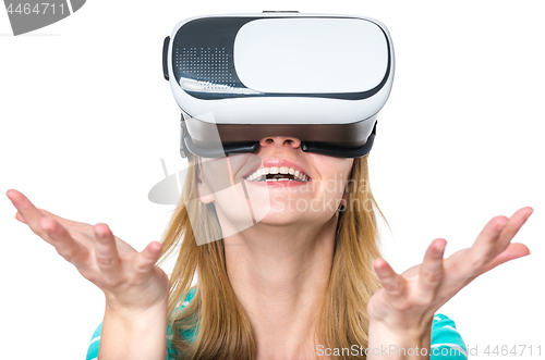 Image of Woman looking in VR glasses