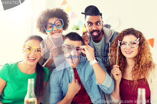 Image of happy team having fun at office party