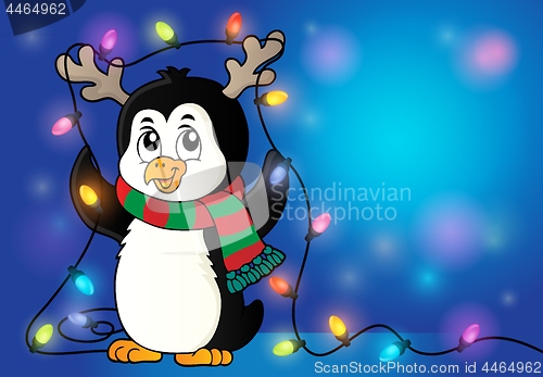 Image of Penguin with Christmas lights image 2