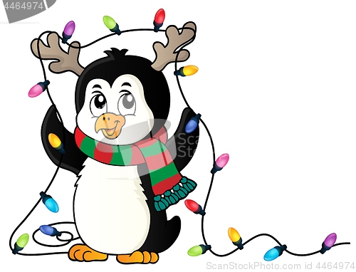 Image of Penguin with Christmas lights image 1