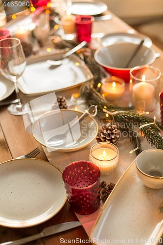 Image of table served and decorated for christmas dinner