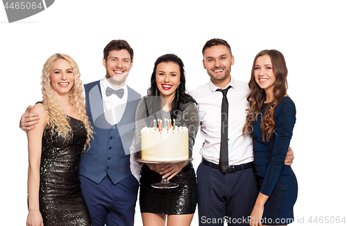 Image of happy friends with big cake at birthday party