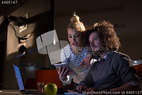 Image of young designers in the night office
