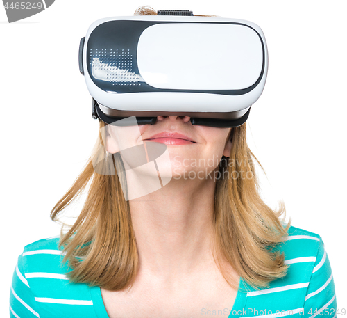 Image of Woman looking in VR glasses