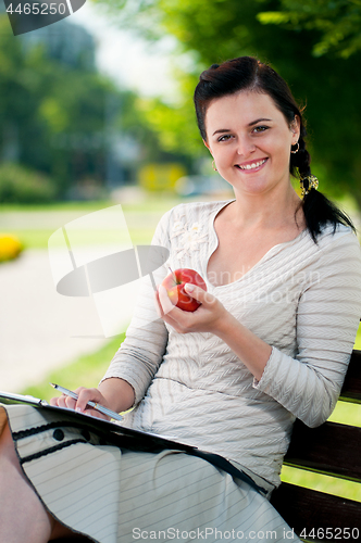 Image of Young woman outdoors