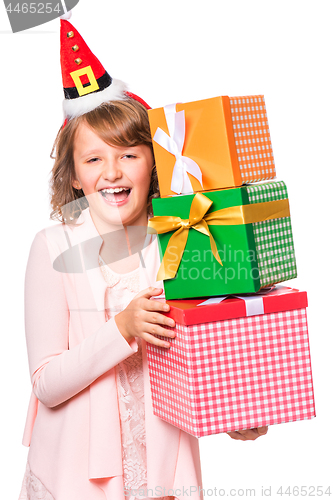 Image of Girl in santa hat with gift box